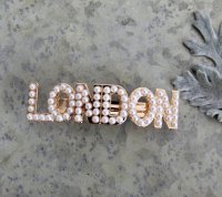 hårspänne london
