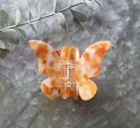 Hårklämma - Liten fjäril orange 